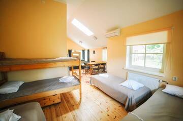 Фото номера Семейный номер с видом на сад Гостевой дом Guest House Rannaliiv г. Вызу 5
