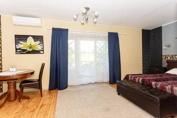 Фото номера Полулюкс с видом на сад Гостевой дом Guest House Rannaliiv г. Вызу 8
